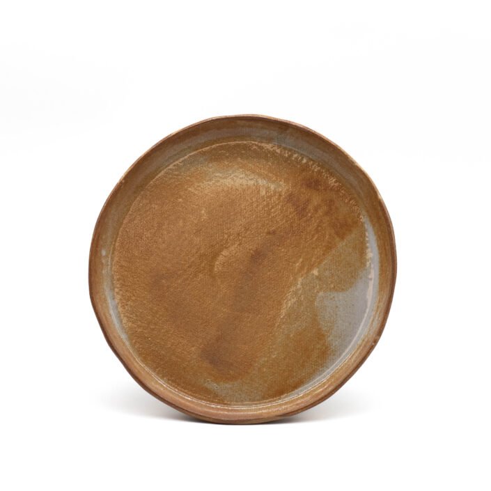 Platos redondos tostado y blanco